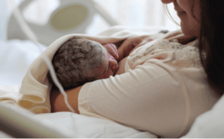 home blog image middle New mother breastfeeding her baby